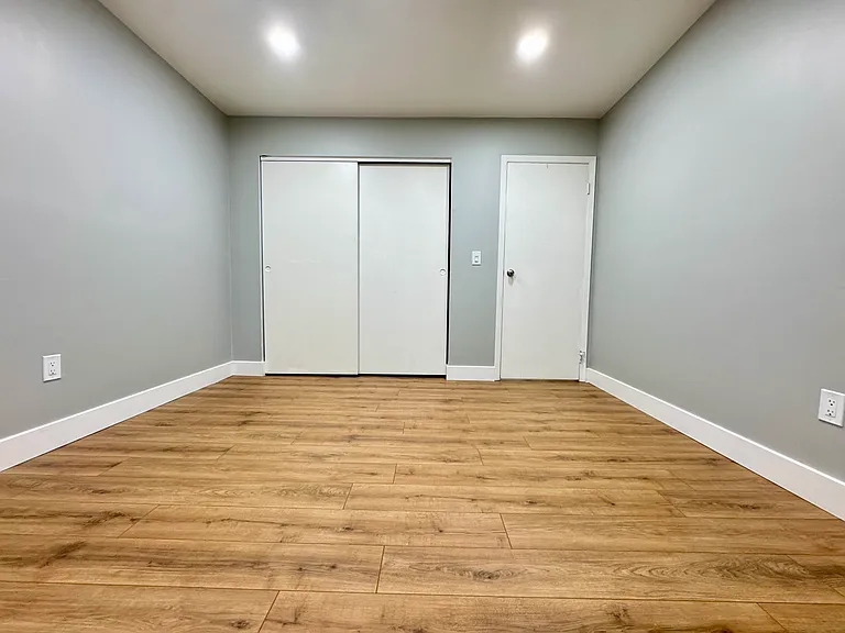 The 2nd Bedroom includes brand new flooring and new ceiling lights.
