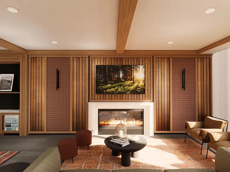 Cozy seating and a welcoming fireplace make the game room lounge at Modera Bridle Trails a warm, inviting place to recharge.