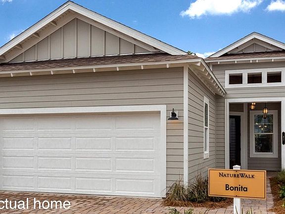 Welcoming entry with 2 car garage