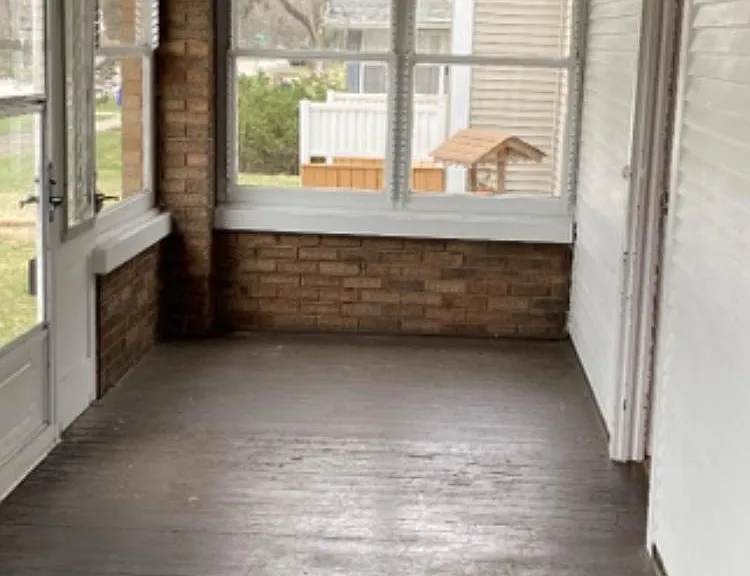 Beautiful three season porch with vintage wood ceiling