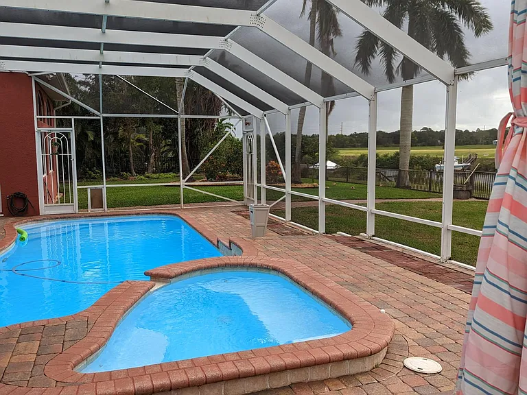 Enjoy this large jacuzzi equipped with two bubblers, wrap around seating and a lounger.