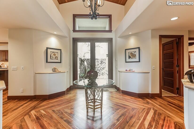 Foyer w/view of lava courtyard entry from garage.