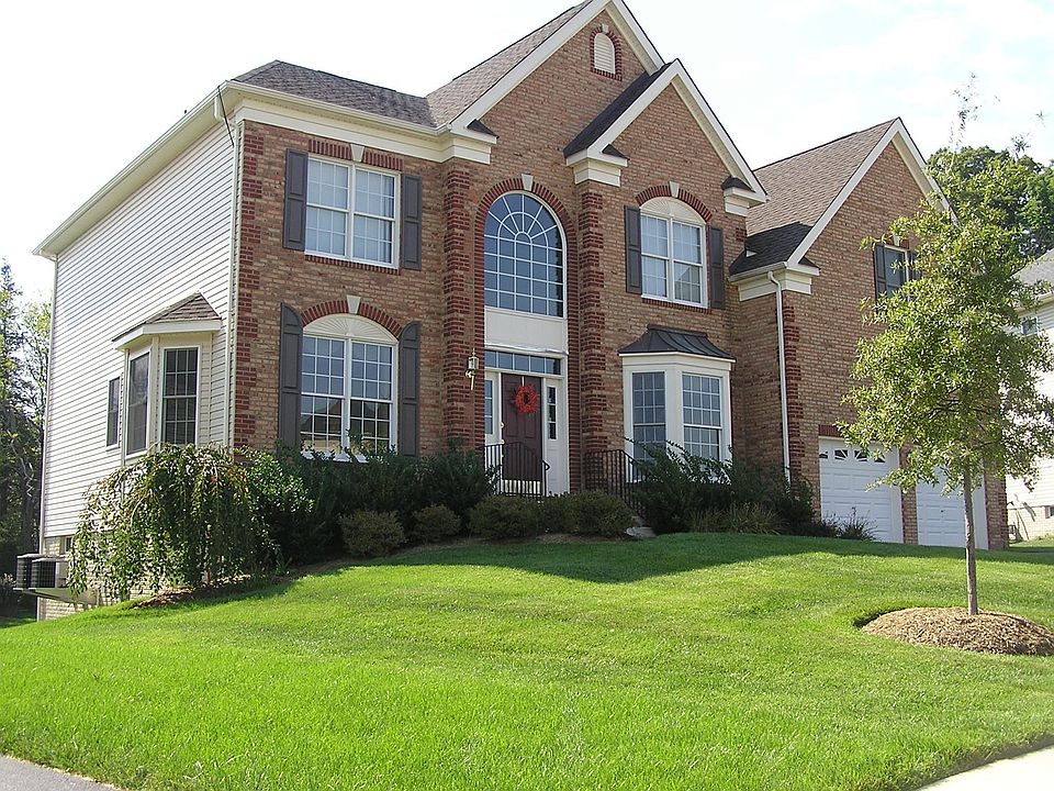 Brick Front Home in Golf Community