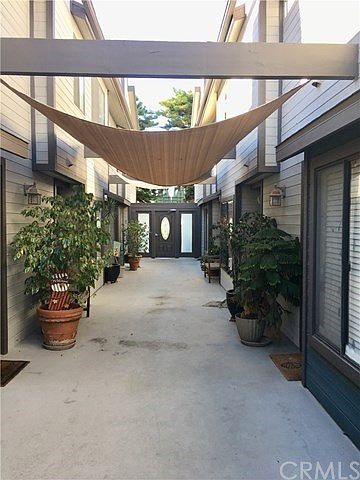 Secure, 10 home community with 5 homes on each side. This one is at the end with only ONE shared wall!