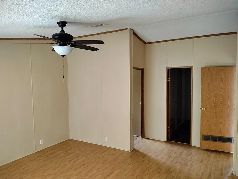 Primary room with a walk in closet.