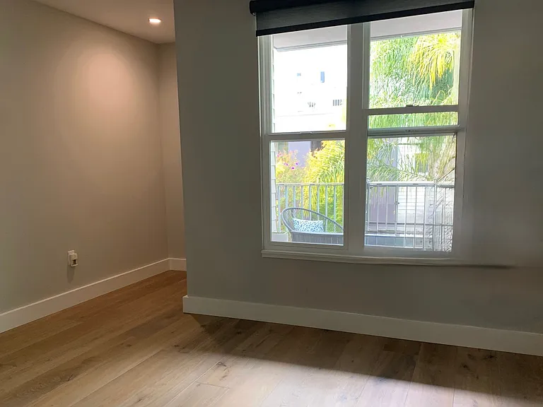 Downstairs guest room, upgraded recessed lighting though out home.