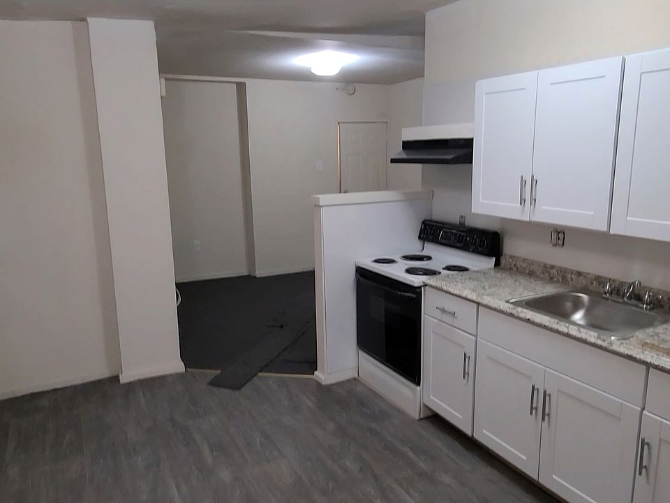 view of living room & dine-in kitchen