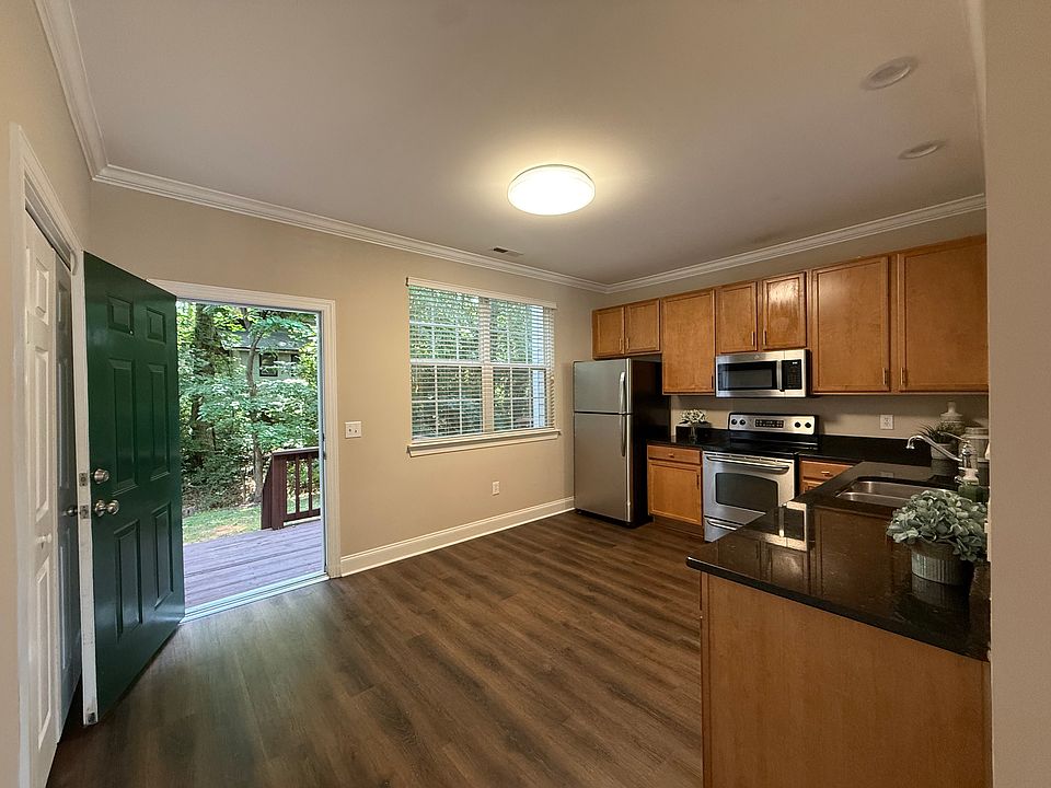Beautiful kitchen with lots of cabinet storage. Granite countertops. All kitchen appliances! Plus, a beautiful , quiet and peaceful back deck.