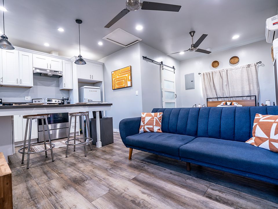 One common living space with all essentials. The sofa is a one click step to open flat into a sofa bed.