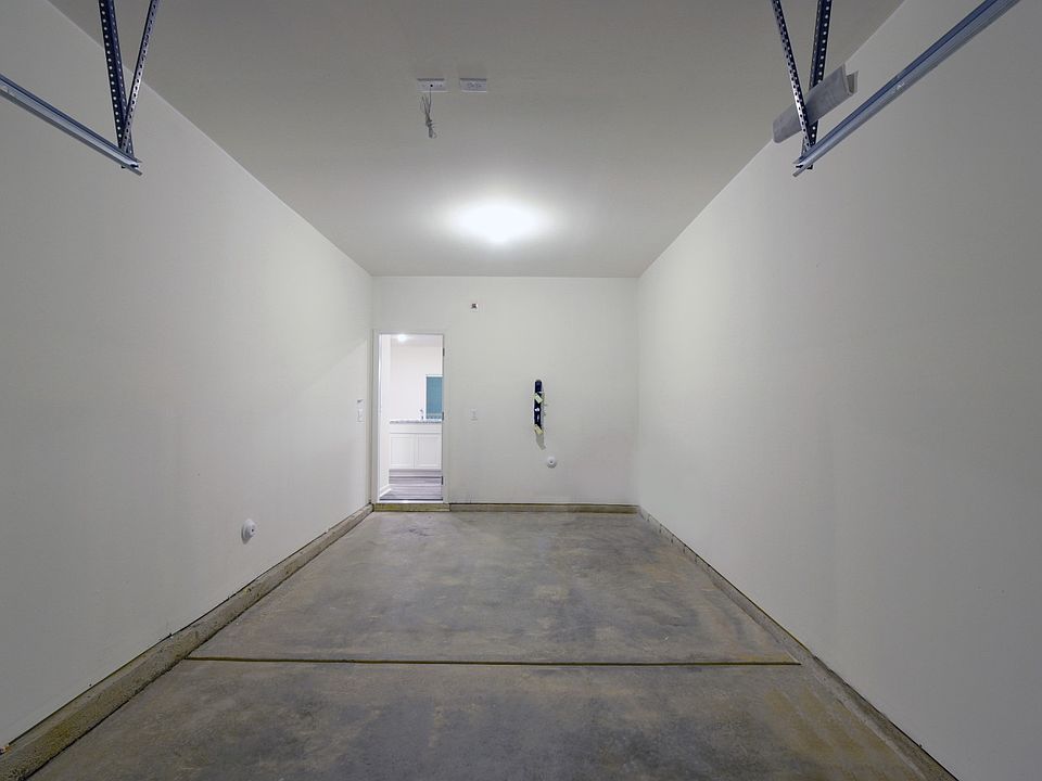Painted garage looking into kitchen area