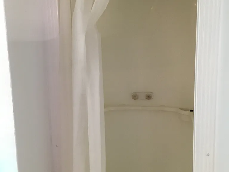 Full bath with walk in shower.