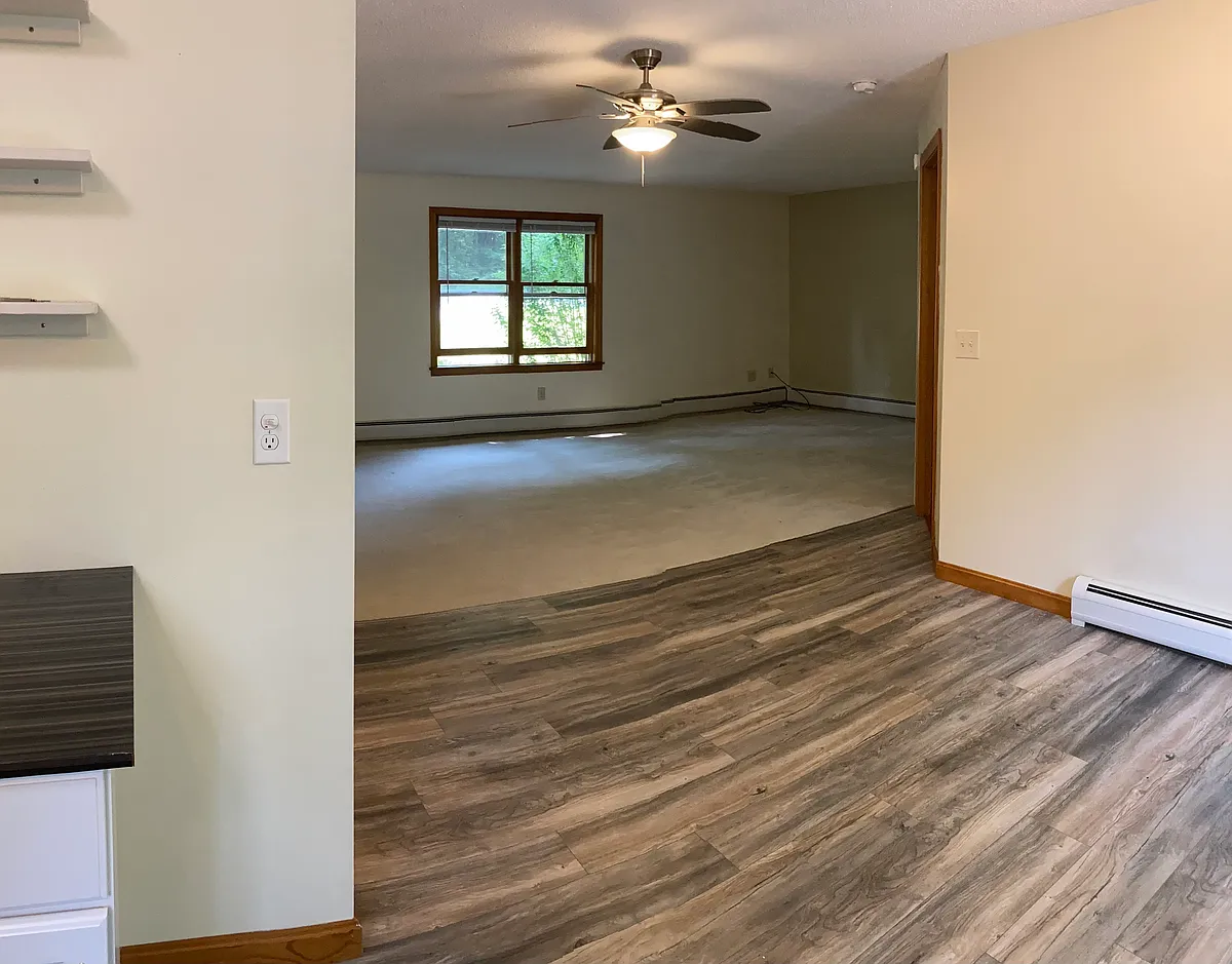 Photo 2 of 5 - Hakala Dr - New Ipswich, NH Living room from kitchen - Hakala Dr