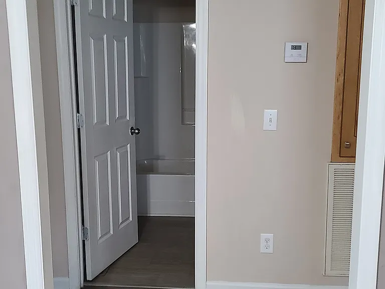 Hall and bathroom between two bedrooms