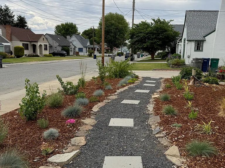 Path from side yard to driveway with native plants