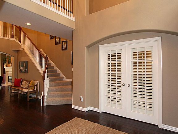 Enter the study through french doors off the foyer.