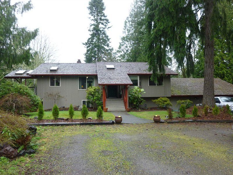 Welcome to 146 Fir Drive NW and island living. Raft Island is a private island with community dock, 