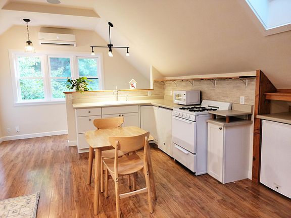 Full , functional kitchen - easy to work in. Gas stove, microwave, refrigerator, freezer, ample storage, garbage disposal, plenty of storage.