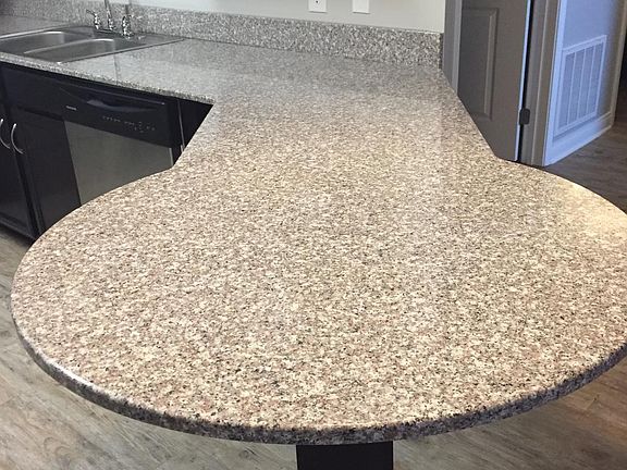 Granite! Great for bar stools!