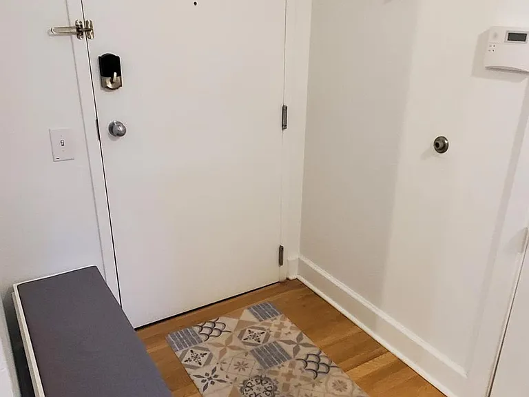 Entry way include bench & coat closet