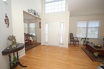 Open Foyer with wood floors
