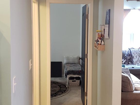 Looking into the closed flex room. Bathroom on the left.