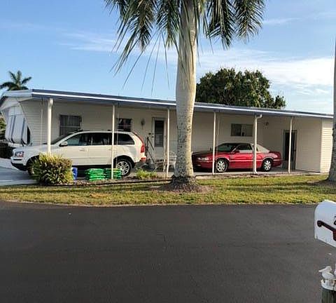 Double car carport on corner lot