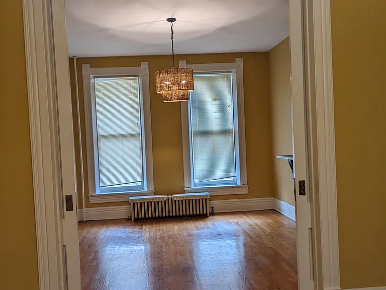 living room with new light fixture