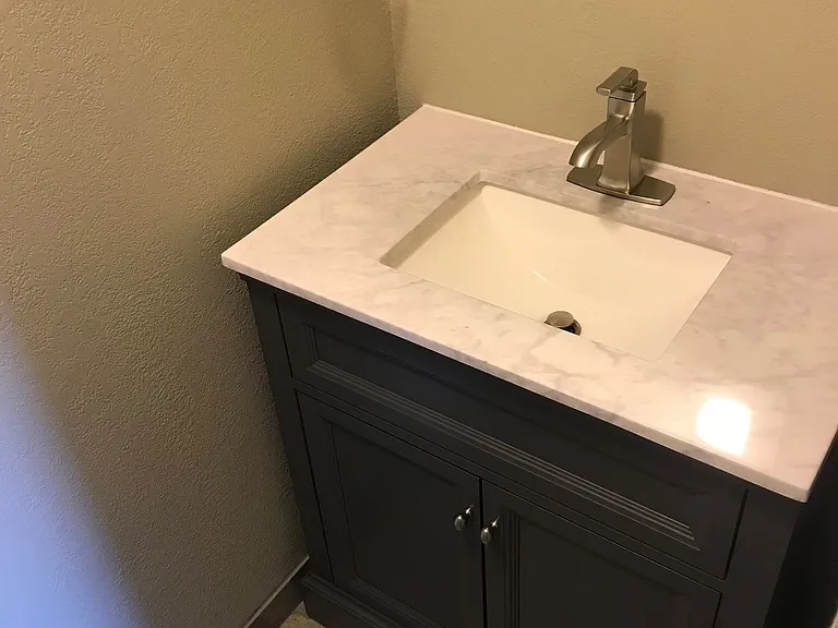 Sink and toilet in master bed