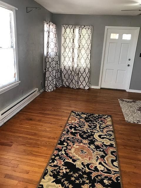 kitchen to living room view. Front door