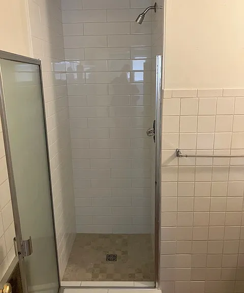 back bathroom with shower