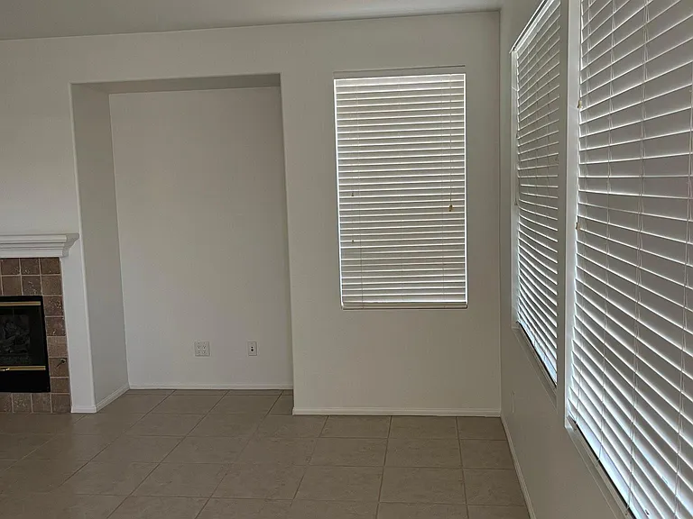 Rt side of great room with windows and blinds 8-14-22
