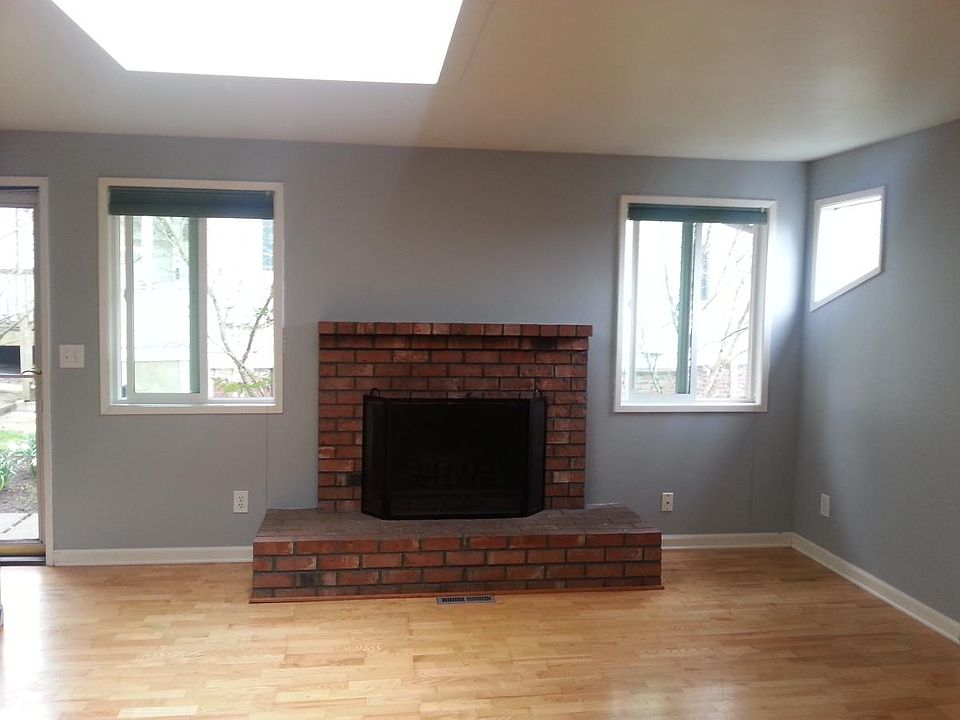 Entry facing front door and fireplace - Lg Skylight
