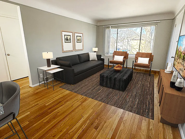 From newly updated wood plank flooring to sleek grey kitchen cabinetry, all is cool inside.