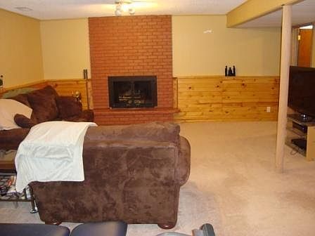 HUGE family room in lower level with a second fireplace.