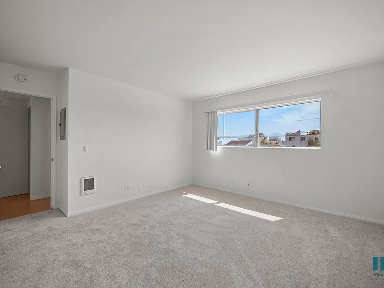 Spacious Carpeted Bedroom