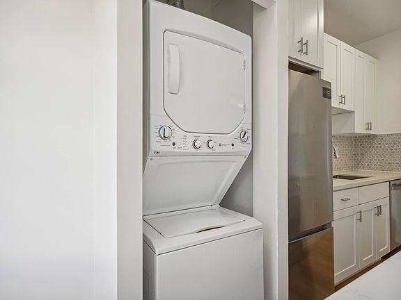 Closet with an in-unit washer and dryer