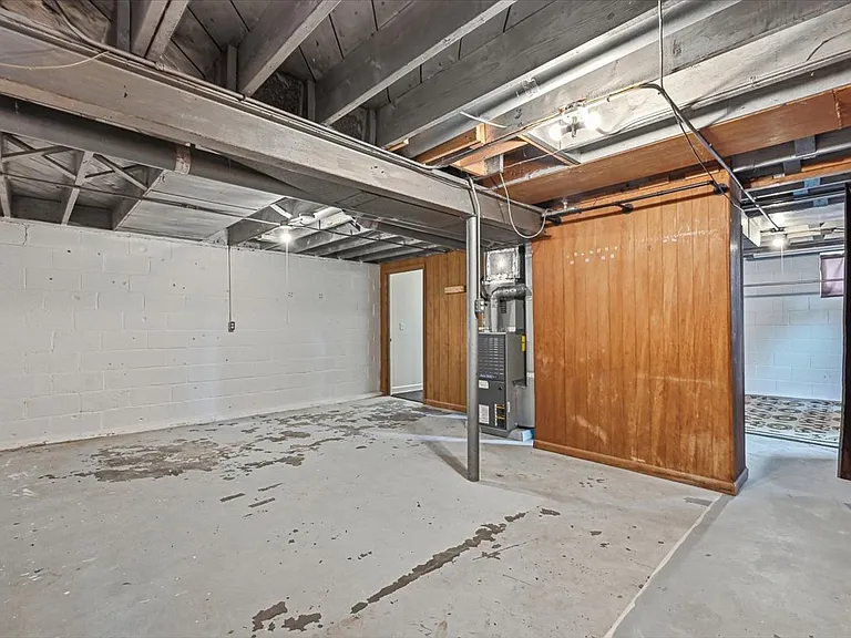 Tons of unfinished storage area.