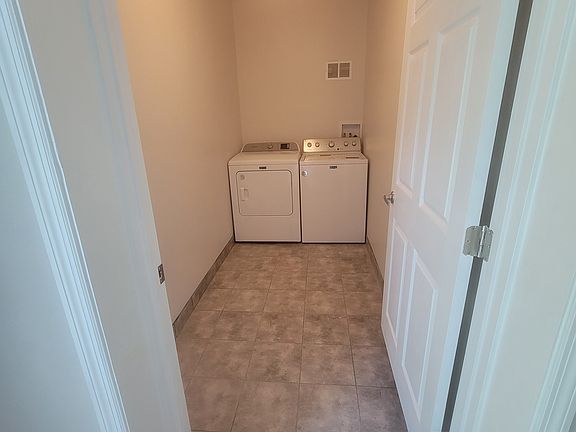 Inside the laundry room that doubles as pantry room if desired