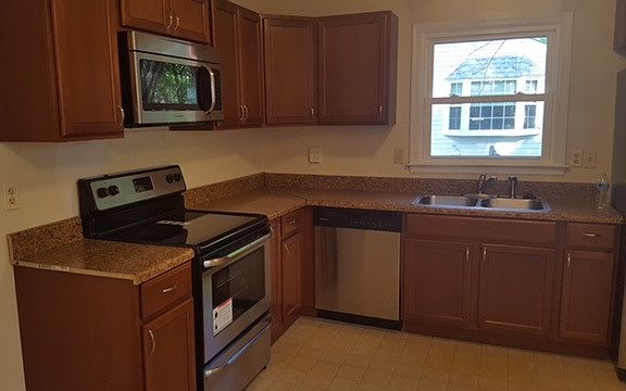 Renovated kitchen w/ new cabinets and stainless steel applia