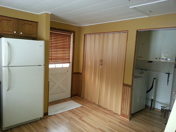 kitchen/laundry is behind the closed doors...there will be d