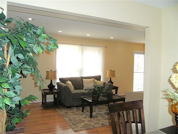 Living room and front window (with great view of park across street)