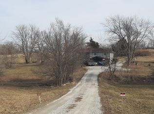 13915 McElroy Ln, Rayville, MO 64084