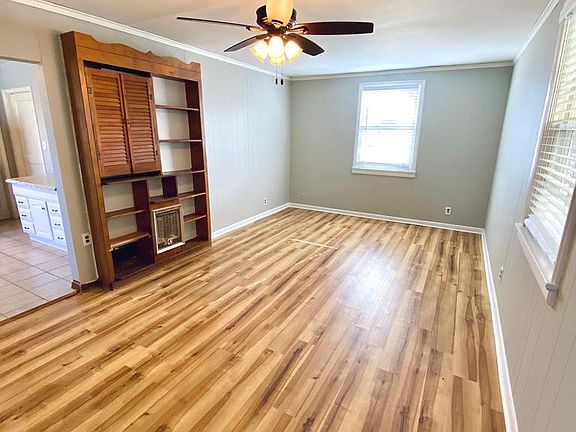Large bonus room with new floors - great as an office space or music room