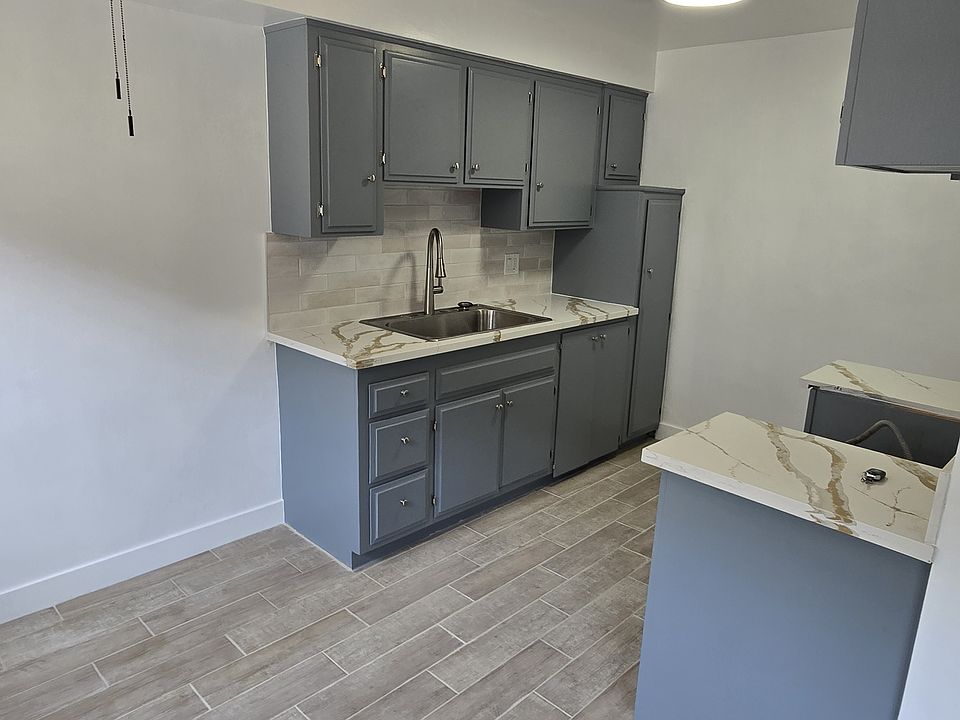 renovated kitchen and new countertops and fixtures