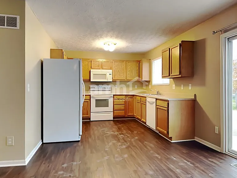 8888 Woolstone Ct — Photo 3
