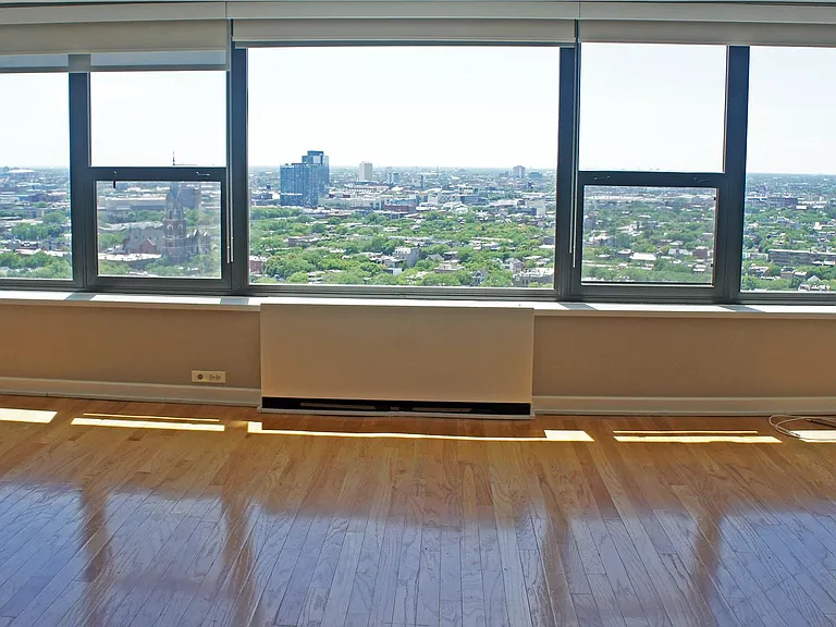 Spacious studio with hardwood floors.