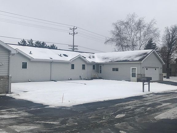 The driveway view of both units