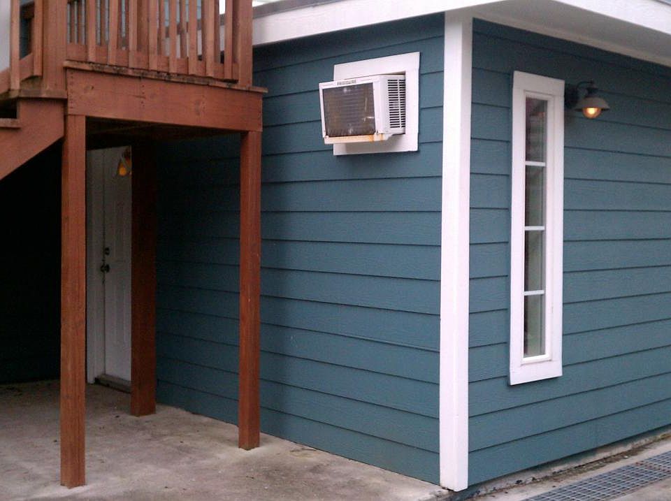 Front door is under stairs. Unit has 1 through wall A/C and heat combo unit and 1 additional through wall A/C and electric space heater.