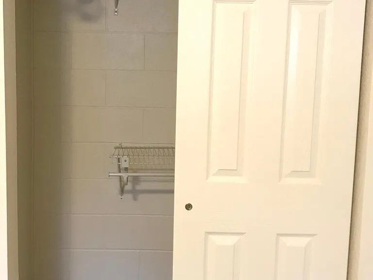 Walk-in closet in bedroom.
