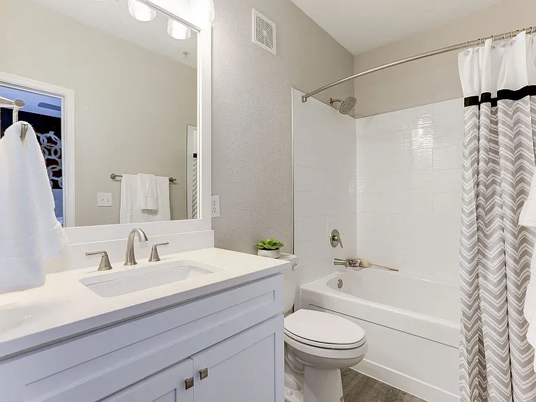 Garden soaking tubs and plentiful storage in bathrooms.